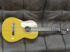 A Jose Mas y Mas Spanish guitar with pine front and mahogany back (model 761B)