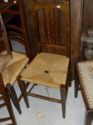Four assorted oak framed rush seated dining chairs,