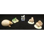 A Herend porcelain hedgehog, two figure groups as pairs of rabbit kittens,