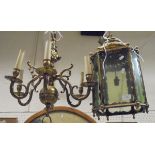 A brass and glazed ceiling lantern in the Middle Eastern style,