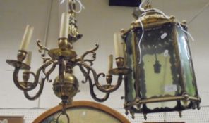 A brass and glazed ceiling lantern in the Middle Eastern style,