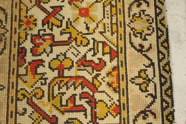 A Persian rug, the central panel set with stylised floral medallion on a red, blue and cream ground, - Image 23 of 34