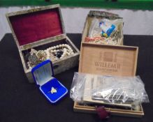 A box of assorted jewellery to include beaded necklaces, etc,