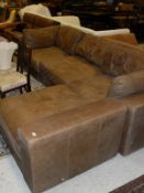 A large brown leather corner sofa of four components CONDITION REPORTS Unknown if it