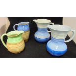 Four Shelley banded ware jugs various