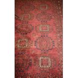 An Afghan style rug,