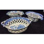A collection of three various 19th Century blue and white pierced lattice work chestnut dishes
