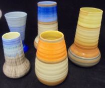 Four Shelley banded ware vases and a Shelley drip ware vase