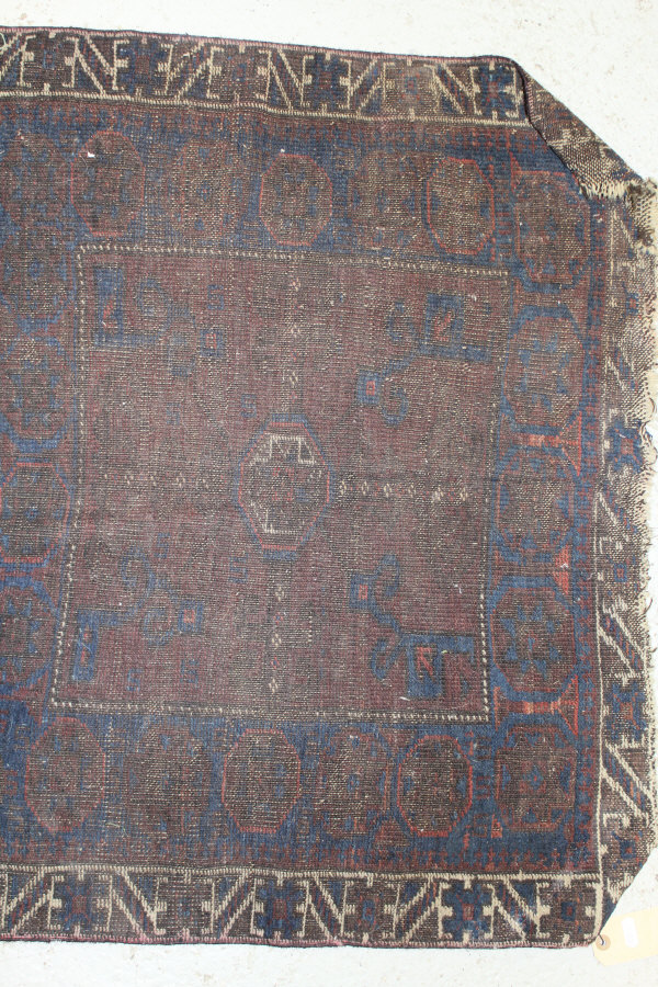 A Caucasian rug, the central panel set with repeating diamond pattern on a neutral ground, - Image 2 of 4