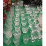 A collection of various drinking glasses to include crystal tumblers, various other tumblers, wines,