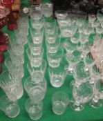 A collection of various drinking glasses to include crystal tumblers, various other tumblers, wines,