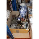 Two boxes of assorted decorative china to include various figurines, blue and white vase, etc,