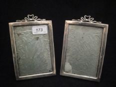 A pair of Edwardian silver photo frames,
