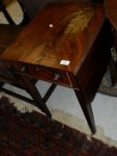 A 19th Century mahogany drop-leaf Pembroke table with single end drawer opposite a dummy drawer,