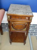 A continental mahogany pot cupboard with marble top and single drawer above a cupboard door,