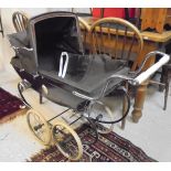 A Silver Cross doll's pram and a stained beech stick back high chair CONDITION REPORTS