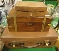 An Army and Navy pigskin vanity case containing various brushes,