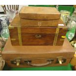 An Army and Navy pigskin vanity case containing various brushes,