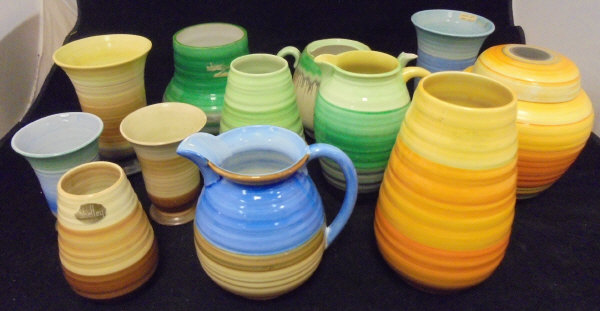 Nine Shelley banded ware vases, one with cover,