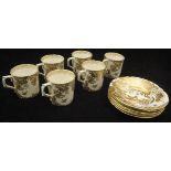 A set of six Royal Crown Derby china "Golden Aves" coffee cans and saucers, No'd.