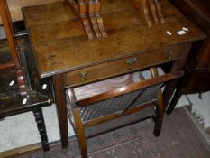 A mahogany commode with flamed mahogany doors and drawer on square sectioned tapering legs,