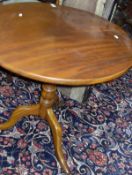 An early 19th Century mahogany tea table,