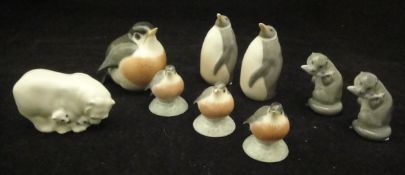 A collection of nine various Royal Copenhagen figures including large robin (2266),