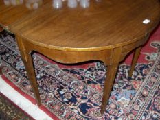 A Regency mahogany D-end extending dining table on chamfered tapering supports CONDITION