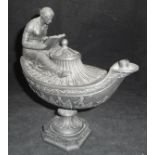 A Wedgwood black basalt urn shaped Vestal oil lamp decorated with seated figure reading,