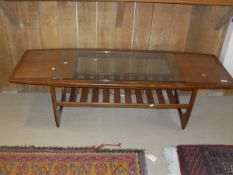 A G-Plan trak coffee table with glass stop