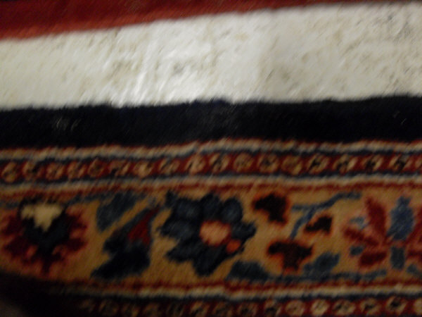 An Eastern rug, the central panel with all over foliate decoration on a midnight blue ground, - Image 8 of 9