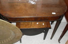 A 19th Century mahogany side table of D-end form raised on square tapering reeded legs together