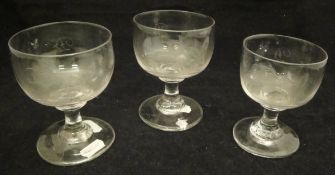 A pair of late 18th Century cut glass goblets and another similar,