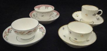 A collection of four late 18th / early 19th Century English polychrome decorated tea bowls / cups