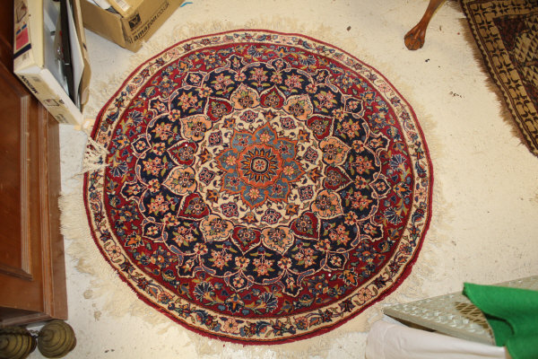 A Persian rug, the central panel set with stylised floral medallion on a red, blue and cream ground, - Image 3 of 34