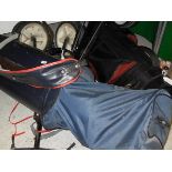 A golf bag and trolley containing various M T Tourney golf clubs signed by MacGregor and a Dunlop