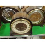 A collection of five various 1930's oak/walnut cased mantle clocks