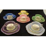 A set of six Rosenthal Elfenbein trios of teacup, saucer and side plate,