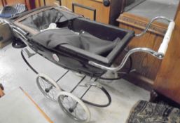 A Silver Cross dolls' pram with bedding CONDITION REPORTS This is NOT a millenium