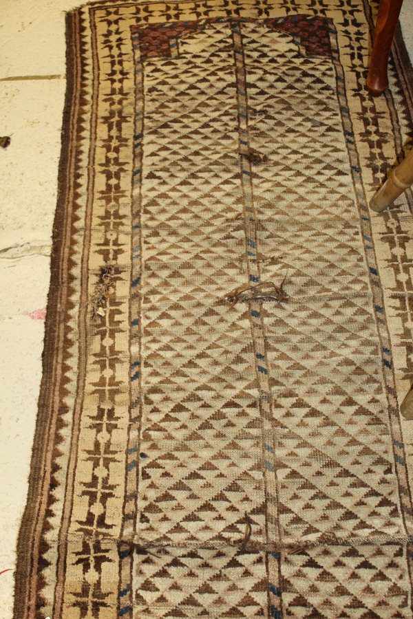 A Caucasian rug, the central panel set with a stylised flower head medallion on a mushroom ground, - Image 3 of 3