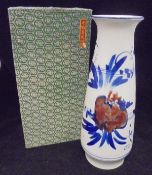 A modern Chinese polychrome decorated tapering vase with flared rim bearing script mark to base,