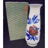 A modern Chinese polychrome decorated tapering vase with flared rim bearing script mark to base,