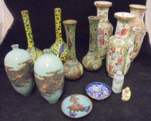 A collection of three Chinese famille rose vases,