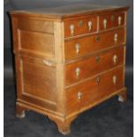 An 18th Century oak chest with a Cavetto moulded top,