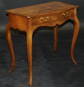 A George III "French Hepplewhite" mahogany serpentine fronted side table with single drawer and