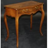 A George III "French Hepplewhite" mahogany serpentine fronted side table with single drawer and