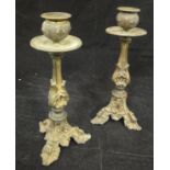 A pair of 19th Century gilt bronze candlesticks in the Rococo taste with facet shaped column set