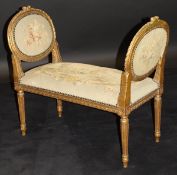 A 19th Century carved giltwood and gesso framed dressing stool in the Louis XVI taste,
