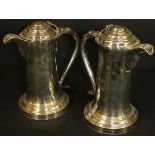A pair of 18th Century Sheffield plate ewers of plain form with shell and scrolling applied