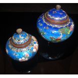 A Japanese Ginbari cloisonné lidded pot with a dark to light blue ground fade decorated with